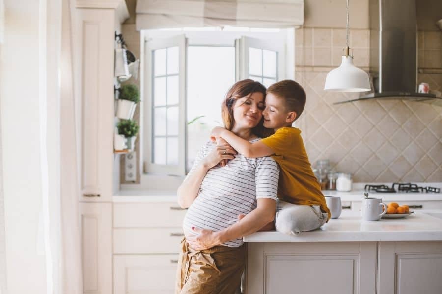 Mum with children https://www.canva.com/media/MADdgM7coFg